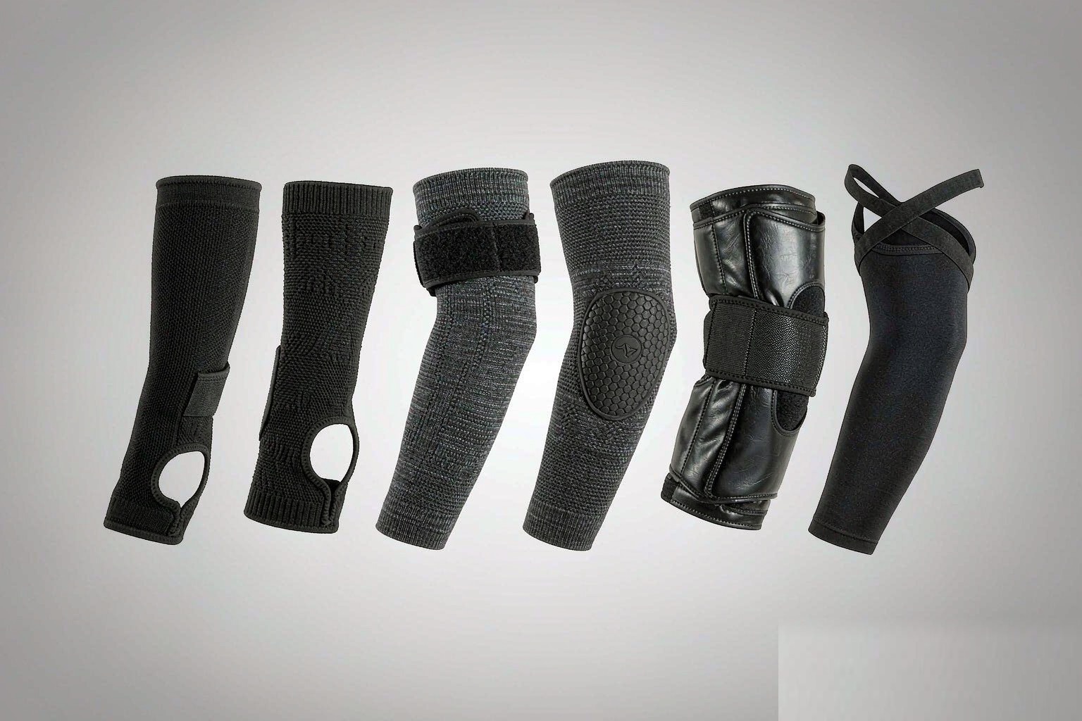 Elbow support gear: knitted sleeves, strap reinforced braces and tennis elbow straps